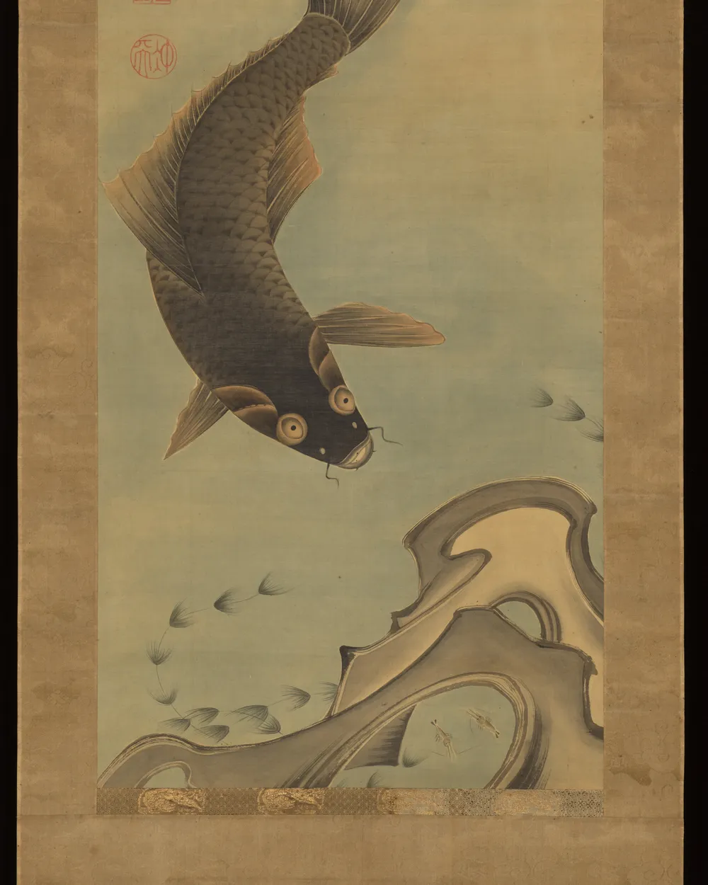 A carp turning in water, ink on silk
